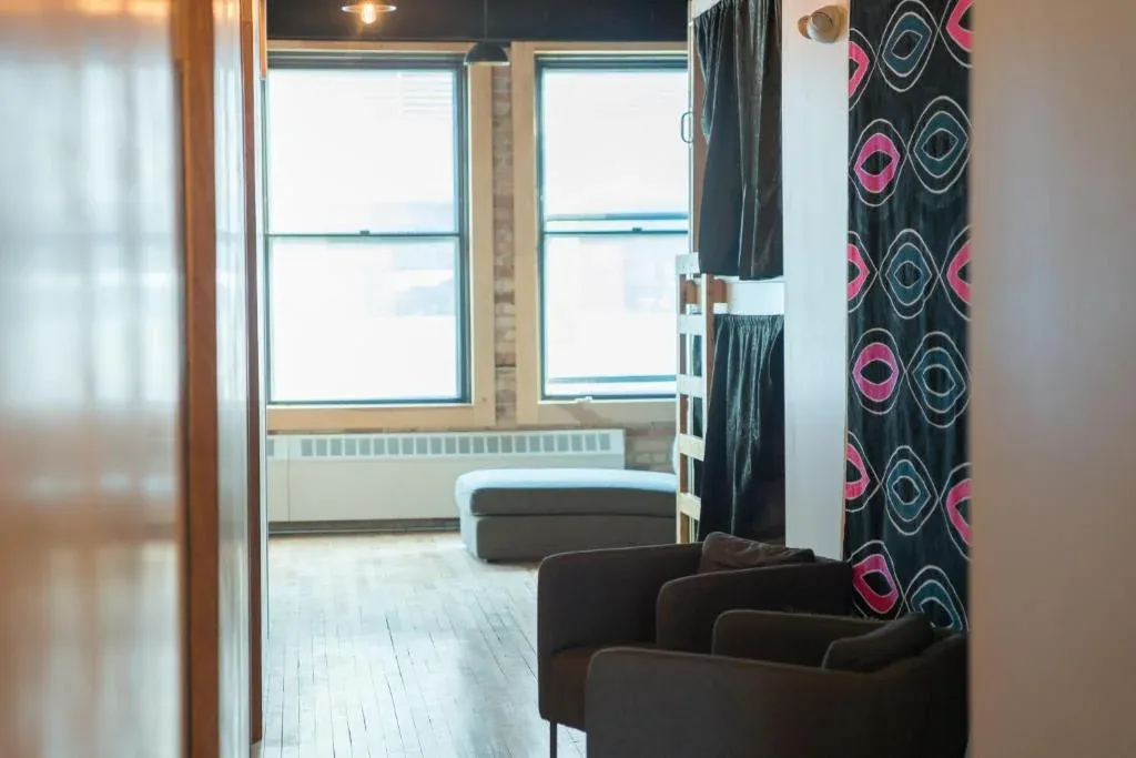 Bright lounge seating by large windows