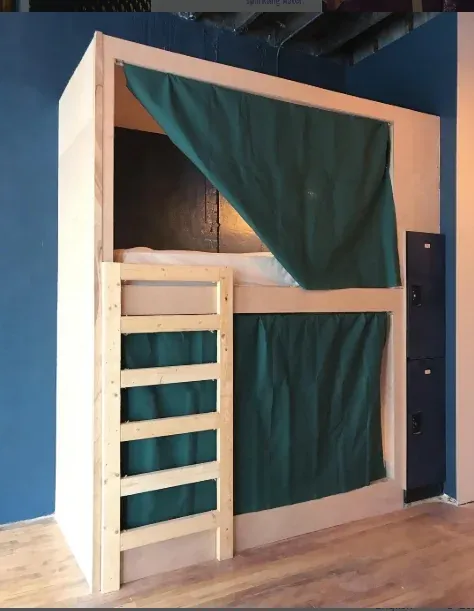 Stacked pod bunks with privacy curtains